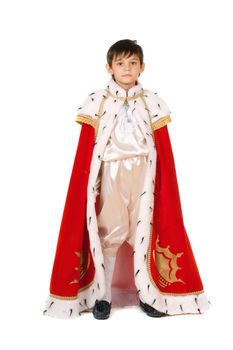 Little boy dressed in a robe of King