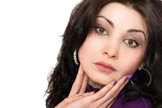 Closeup portrait of attractive young woman in a purple jacket. Isolated