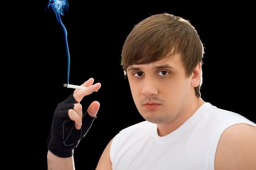 Portrait of the young man with a cigarette
