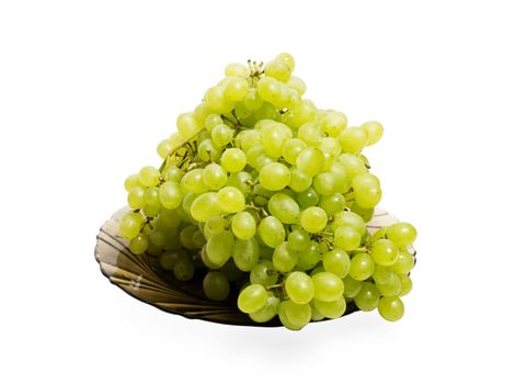 bunch of grapes on a plate isolated