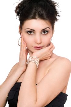 Portrait of pretty young woman in a black dress. Isolated