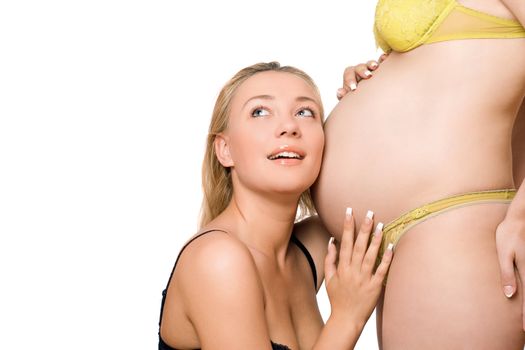 Pretty girl and belly of pregnant girlfriend