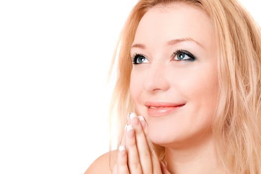 Closeup portrait of a smiling blonde. Isolated