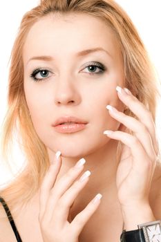 Closeup portrait of a playful pretty blonde. Isolated