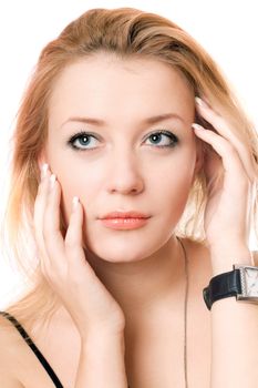 Closeup portrait of a pensive blonde. Isolated