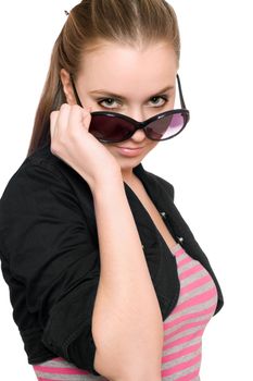 Portrait of pretty young woman in sunglasses. Isolated