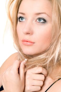 Closeup portrait of a lovely pretty blonde. Isolated