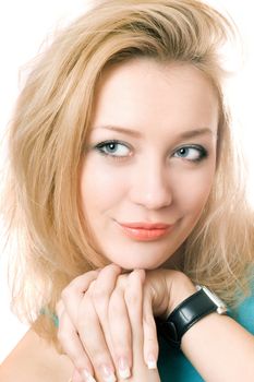 Closeup portrait of a young blonde. Isolated on white
