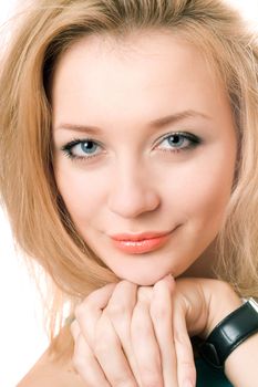 Closeup portrait of pretty young blonde. Isolated on white