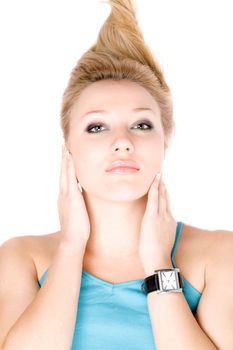 Closeup portrait of pretty blond girl lying on a white