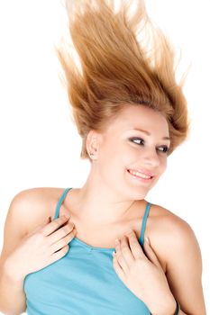 Closeup portrait of happy blond girl lying on a white
