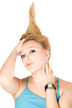 Closeup portrait of lovely blond girl lying on a white