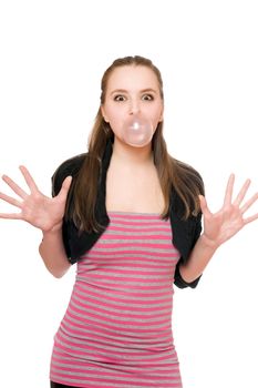 Young woman blowing a bubble from chewing gum