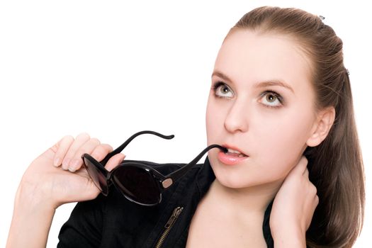 Close-up portrait of pretty young woman with sunglasses