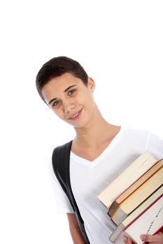 Smiling attractive young teenage boy carrying a pile of books under his arm as he makes his way to classes at college isolated on white