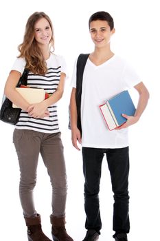 Trendy young attractive teenage boy and girl with college books and bags standing side by side isolated on white Trendy young attractive teenage boy and girl with college books standing side by side isolated on white
