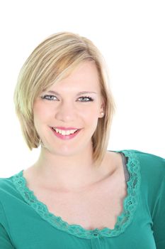 Head and shoulders portrait of a charming young blonde woman with a beautiful smile isolated on white
