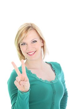 Beautiful smiling friendly woman giving a V-sign for successful achievement, victory or peace isolated on white
