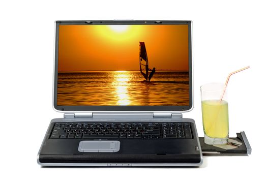 Laptop and cocktail. Isolated on white background