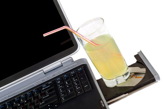 The laptop and cocktail. Isolated on white