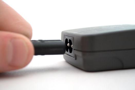 Connection of a power cable to the device