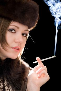 Portrait of the young woman with a cigarette