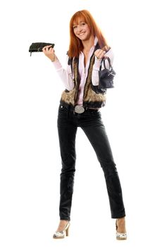 Joyful red-haired young woman with two handbags