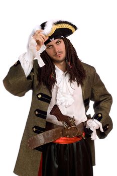 Portrait of young man in a pirate costume with pistol