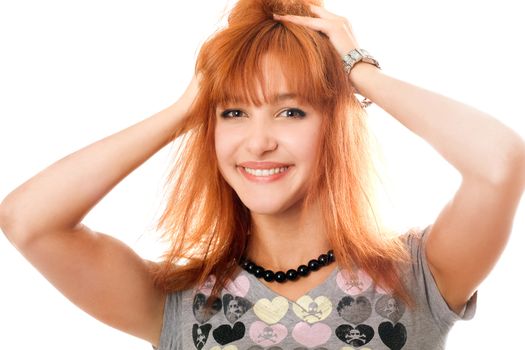 Portrait of cheerful beautiful red-haired girl. Isolated