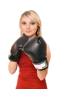 Charming blond young woman in boxing gloves