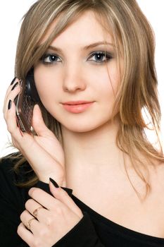Close-up portrait of pretty girl with a phone in her hands