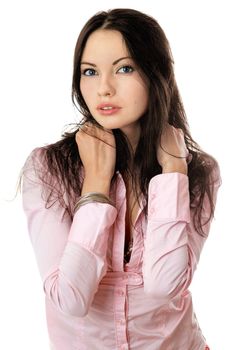 Portrait of beautiful young woman in pink shirt. Isolated