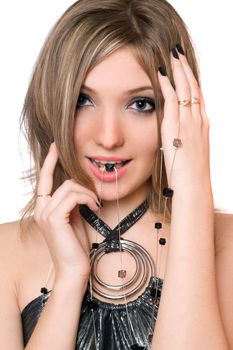 Portrait of smiling pretty girl with a bead in her mouth