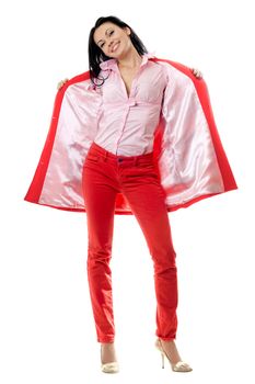 Cheerful young brunette in red suit. Isolated