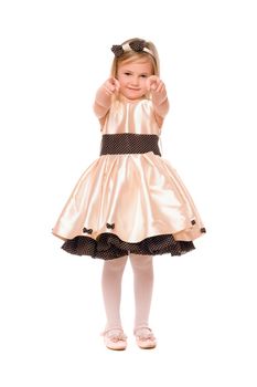 Charming little lady in a dress. Isolated on white