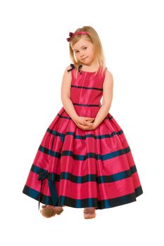 Cute little blond girl in a long dress