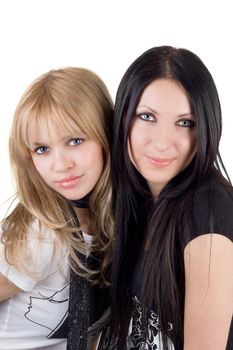 Portrait of the two pretty smiling girlfriends. Isolated