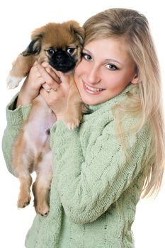 Young cheerful blonde with a puppy. Isolated on white