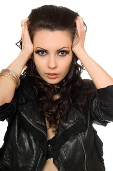 Closeup portrait of beautiful brunette in black clothes. Isolated