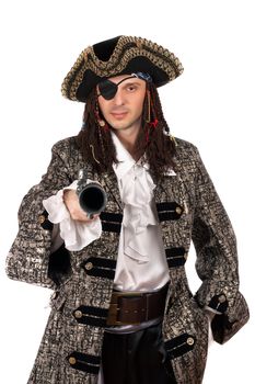 Portrait of man dressed as pirate with a pistol in hand. Isolated on white