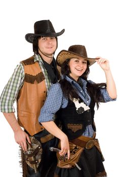 Portrait of a young cowboy and cowgirl. Isolated