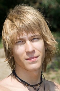 portrait of the young man outdoors