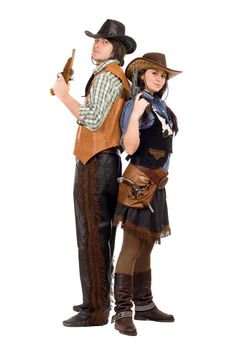 Young cowboy and cowgirl with a guns in hands. Isolated on white