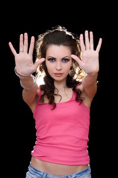 Portrait of sensual young brunette in a pink t-shirt