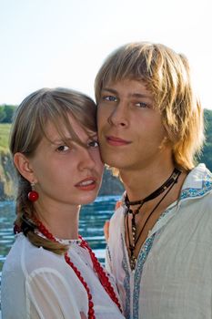 Portrait of the young beautiful couple outdoors