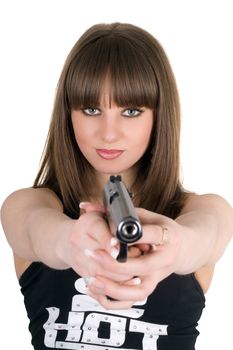Pretty girl in a vest with pistol