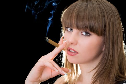 Portrait of the young woman with a cigar