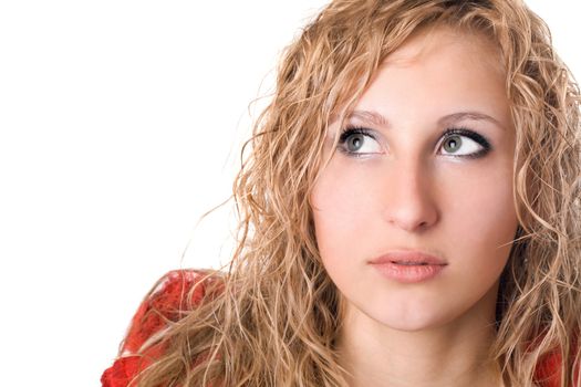 Portrait of pretty thoughtful young blonde. Isolated on white