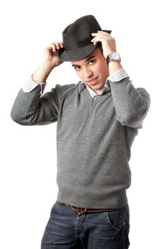 Attractive young man wearing black hat. Isolated