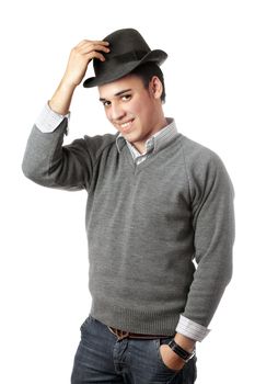 Smiling attractive young man wearing black hat. Isolated